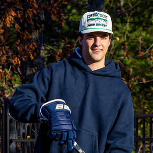 Celly Hockey. Connecticut Pond Hockey Snapback in Cream